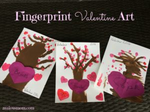 Do your kiddos love using their hands to make art? Then they will love this Fingerprint Valentine Art activity! It's great for the children of all ages and incporates a number of cognitive and motor skills. @zealousmom.com #art #kidartactivities #artactivities #valentines #valentinesday